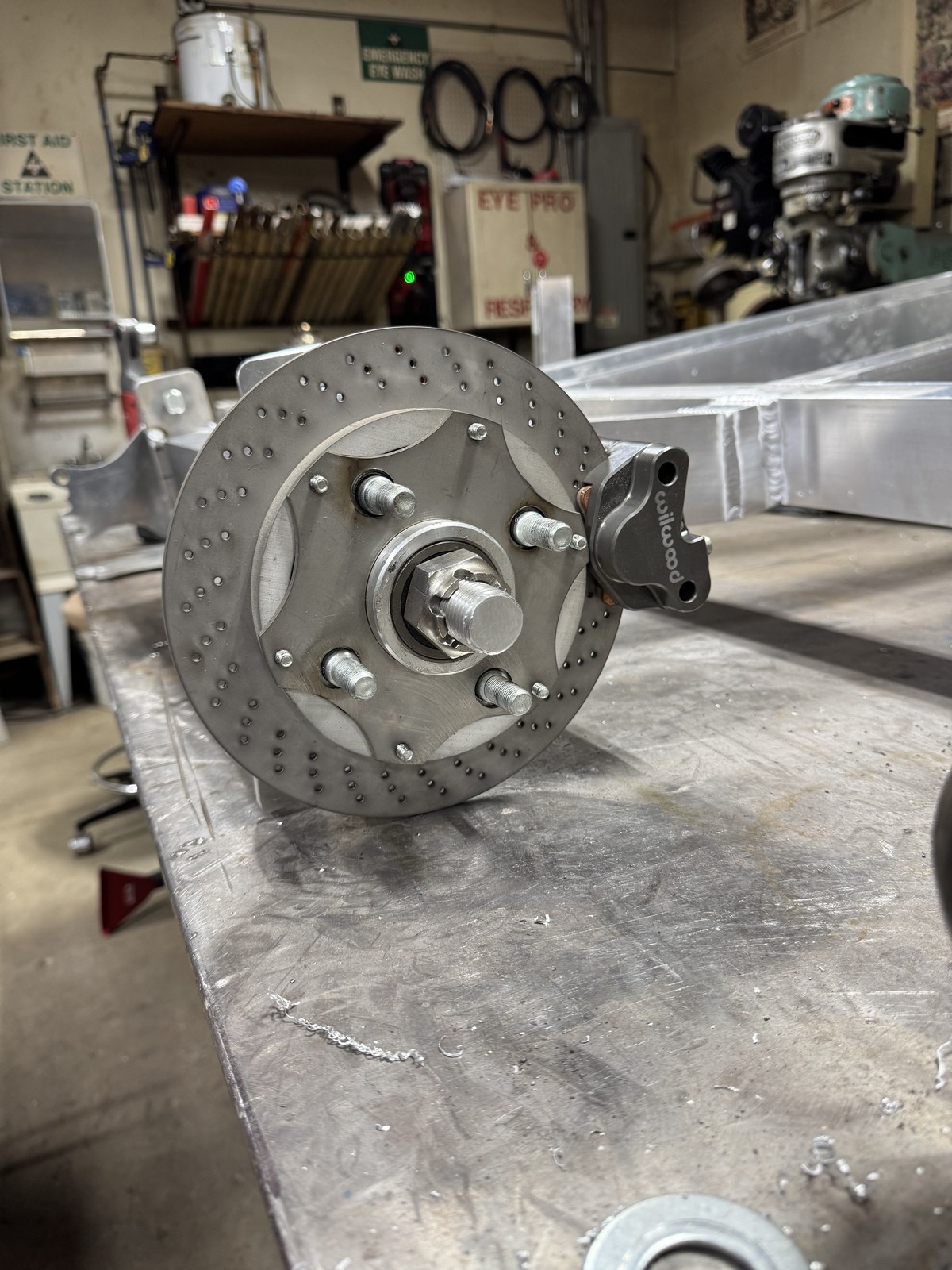 Wilwood kart caliper and custom rotor installed on the front spindle assembly