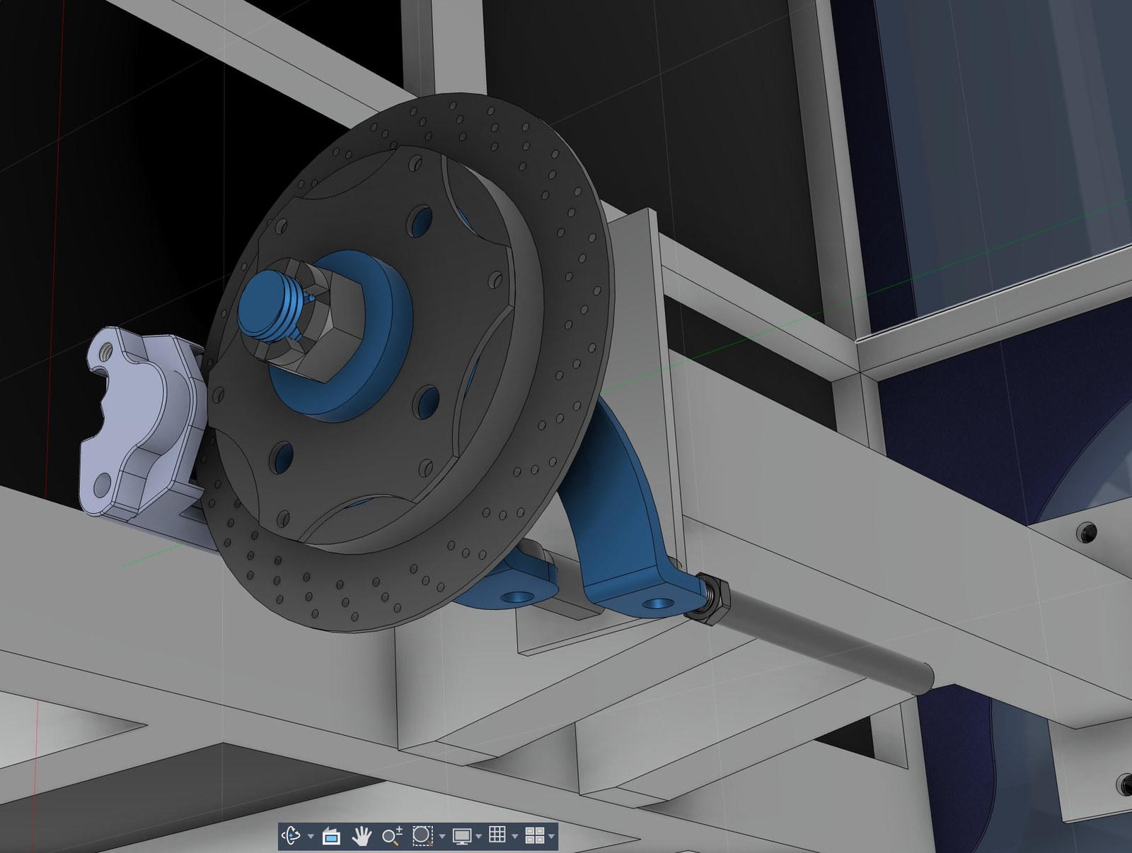 CAD detail of front suspension corner showing custom-machined spindle, hub, two-piece rotor, and Wilwood caliper bracket integrated into aluminum frame