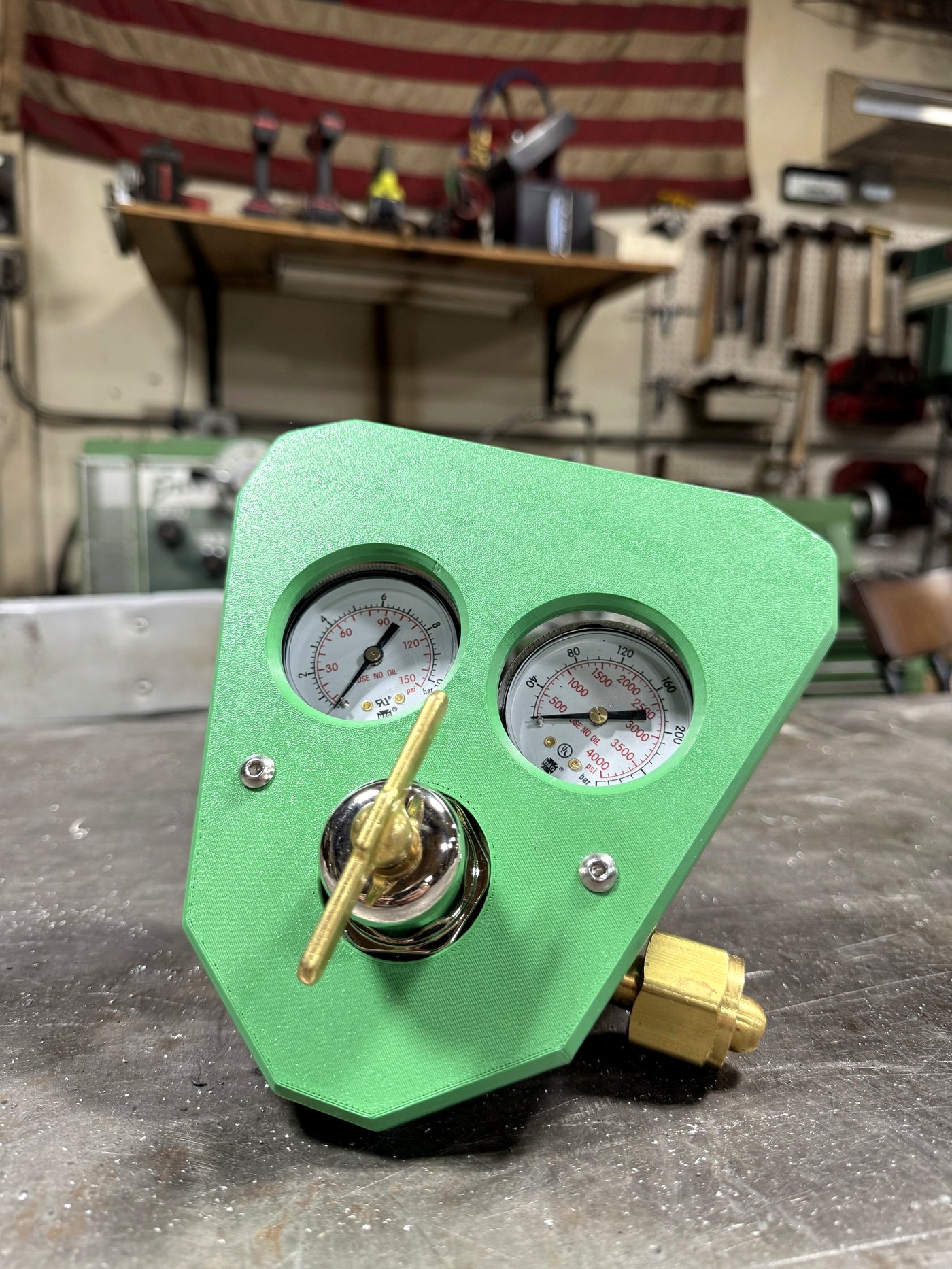 RegShield SM30 at three-quarter angle, bench-mounted, with shop equipment in background
